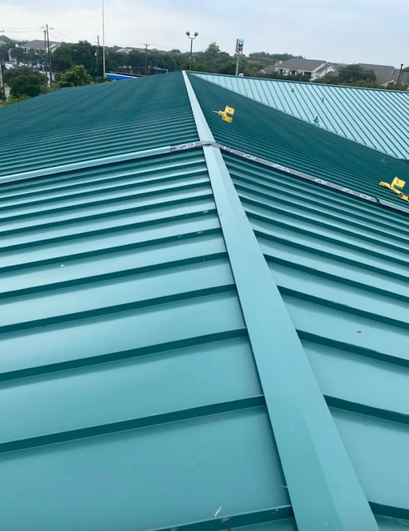 Green commercial metal roof ridge and valley for Metal Roof Repair in Moore